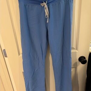 Blue scrub pants (figs)